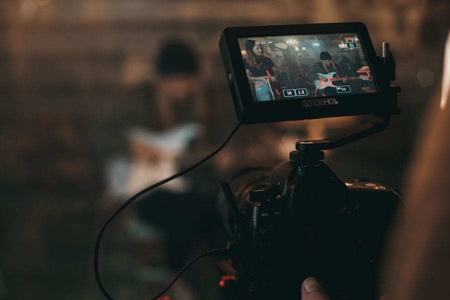 A camera monitor recording a video production for a YouTube channel